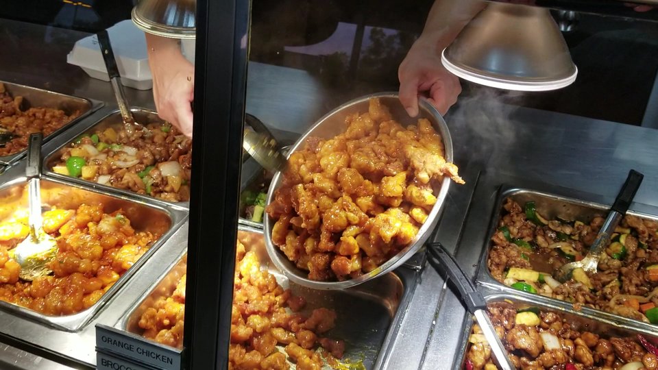 Strip mall restaurant space with cafeteria-style ordering.