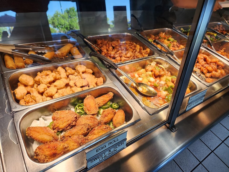 Comfort food spot with indoor dining tables.